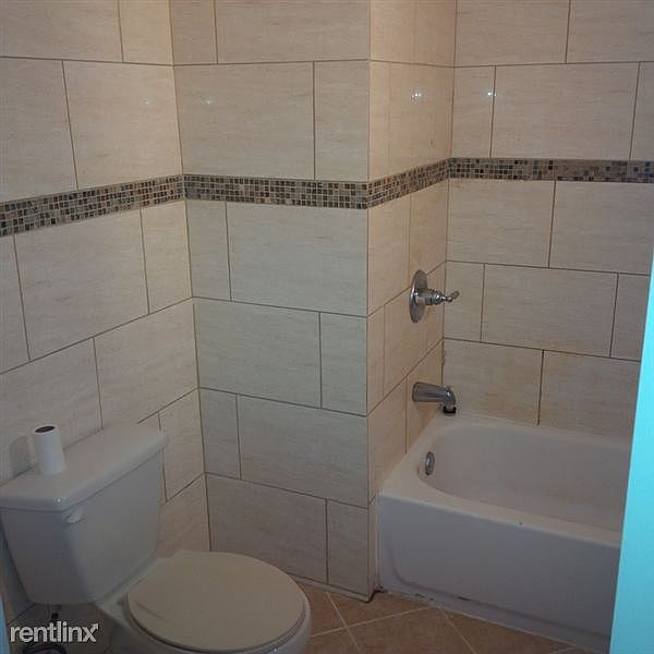 Fully Tiled Bathroom