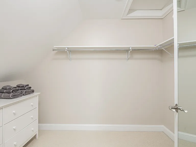 the master bedroom walk-in closet