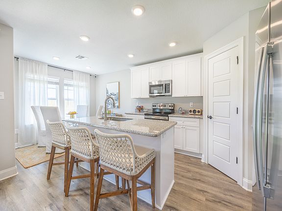 Kitchen in the Kai floorplan at a Meritage Homes community in Gulfport, MS.