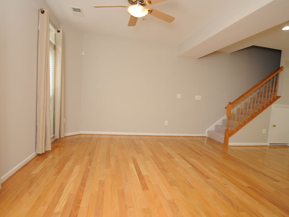 From the front door looking into the family room and stairs that lead to the 3 bedrooms and laundry room.