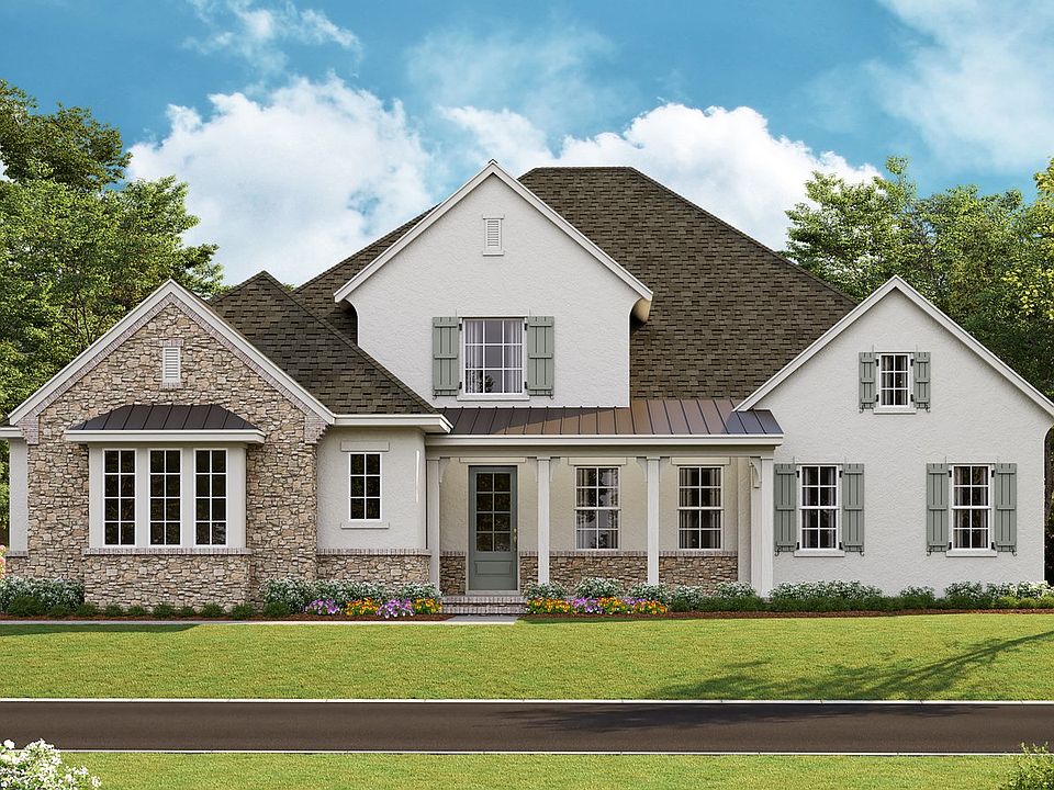 Brentwood - French Cottage c 3-Car Side Load Expanded Garage Note Renderings may show optiona