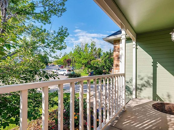 Greet neighbors from the charming front porch!