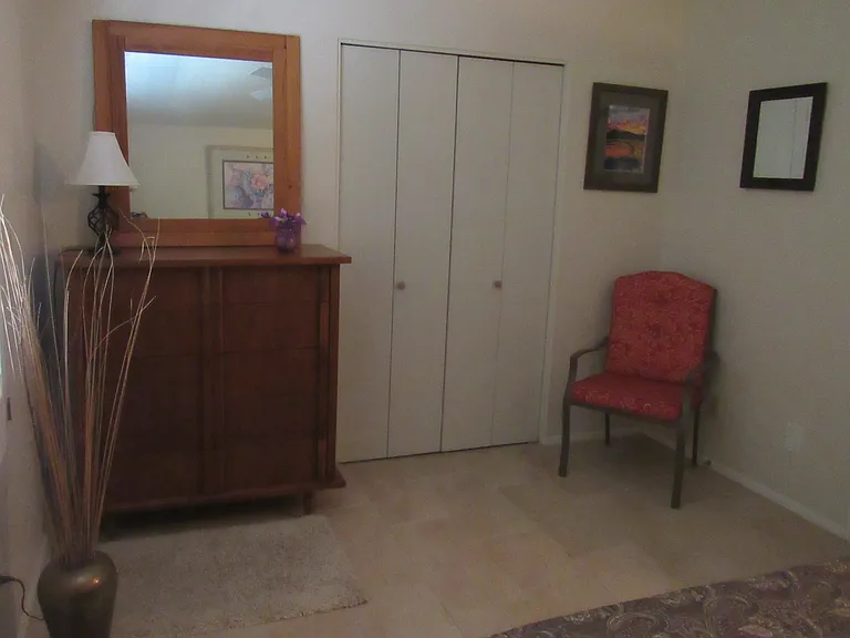 The dresser in the master bedroom accommodates your folding wardrobe and the spacious closet has double above/below hangers. The "changing chair" makes changing clothes a breeze.