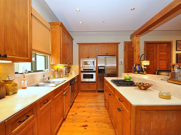 Chef's kitchen with stone countertops