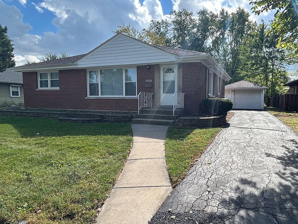 1st image of 609 E 160th Pl