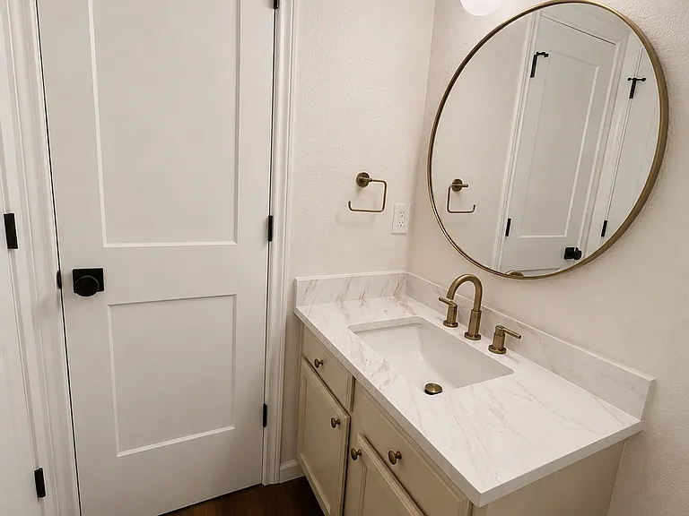 Downstairs Half Bath and Under Stair Storage Closet
