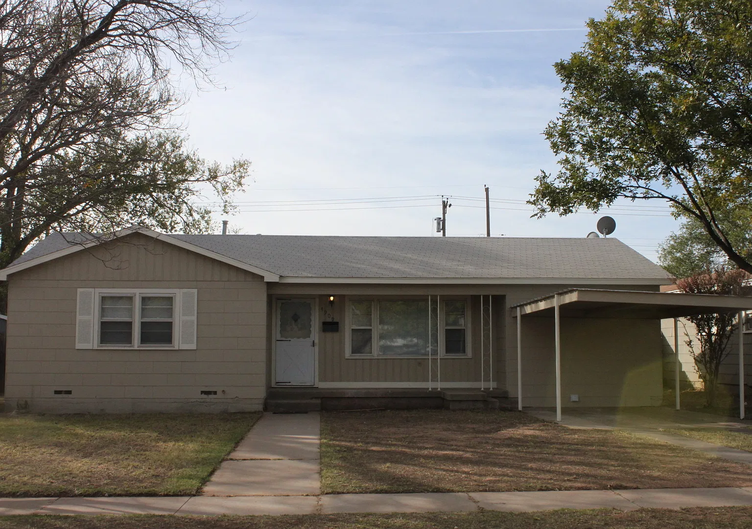 Updated 3-Bedroom Home with Carport and Covered Patio — Photo 1