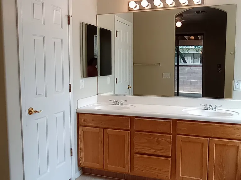 His and hers sinks with private lav.