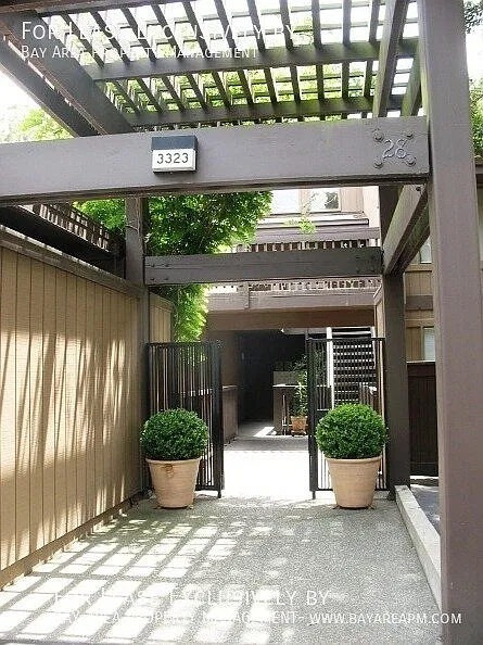 2BD/2BA Bright Condo w/ Sweeping Hill Views & Private Balcony — Photo 1
