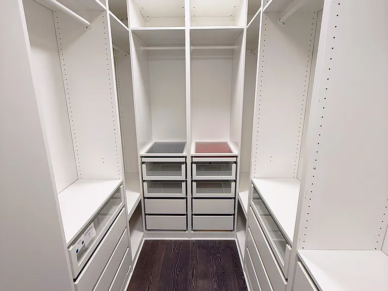 Primary bedroom custom built walk-in closet
