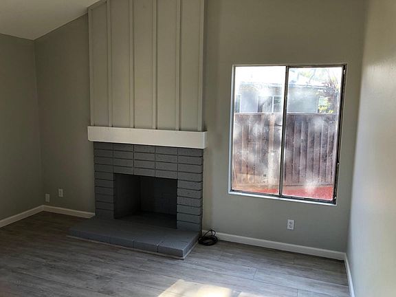 Living Room with Vaulted Ceilings and Fireplace (non-operational)