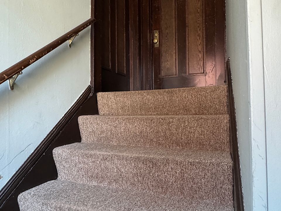 Apt 3 is on the Second Floor of this Triplex Building