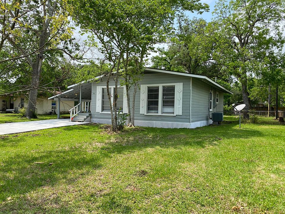 Front Yard, new drive way, covered car port