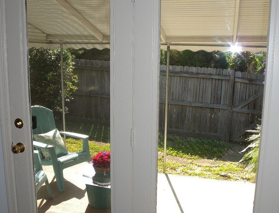 View of COVERED PATIO from Master Bedroom.