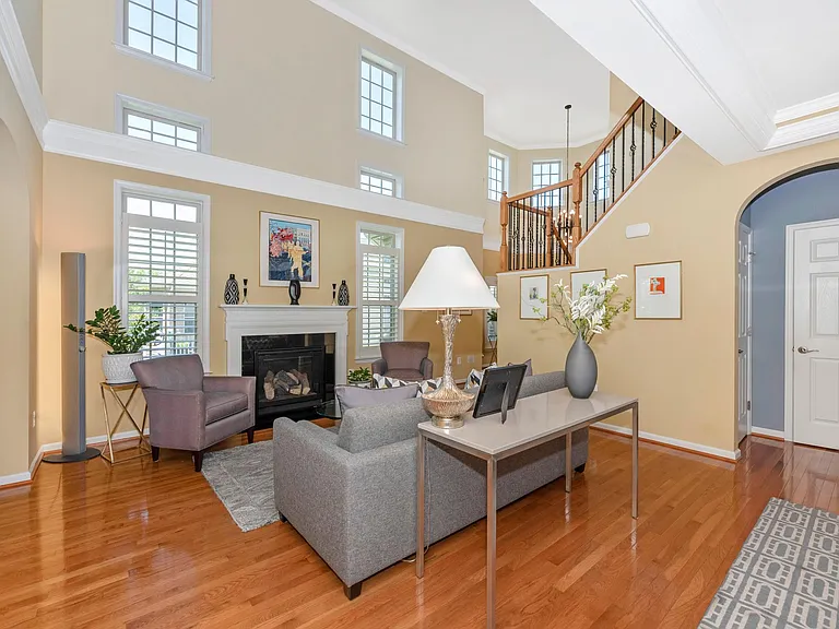 The 2 gray arm chairs are no longer at this property