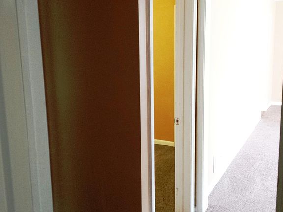 hallway to the 3 bedrooms.