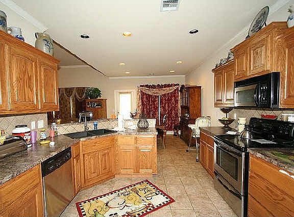 3rd image of 16140 E 76th Ct N