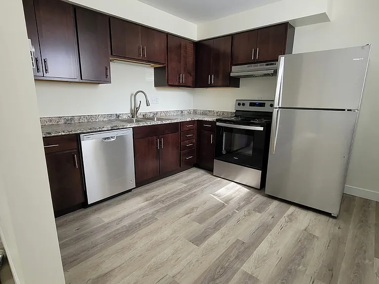 Renovated Kitchen. Actual layout may vary. Studio does not have a dishwasher.