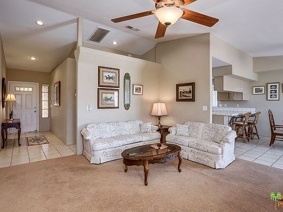 Living room with vaulted ceilings