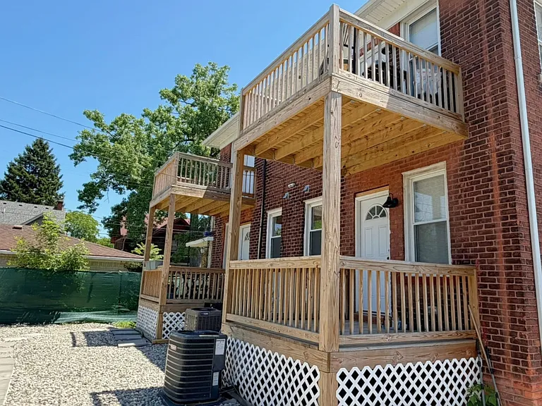 Same back porch, viewed from yard.