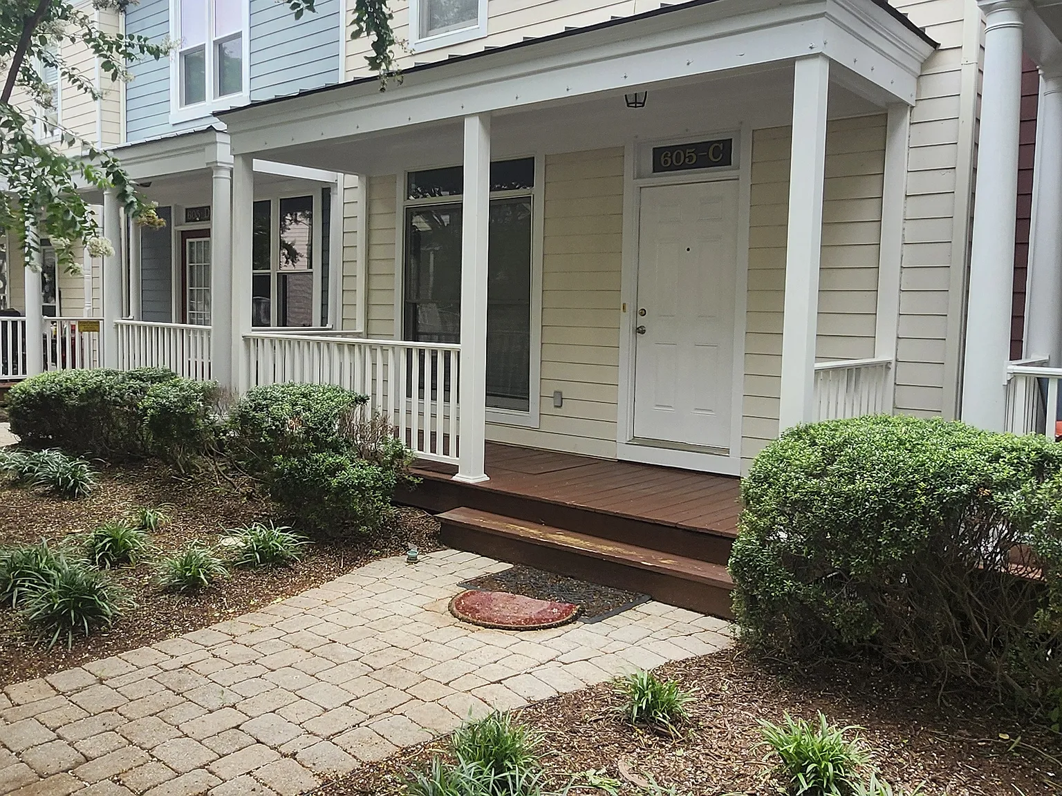 Backporch where you access the garden. Private and good place to cookout.