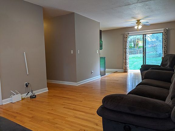 Living rm w/ view of back yd