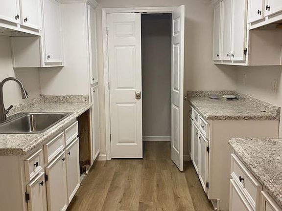 Kitchen with new countertops and new appliances arriving next week.