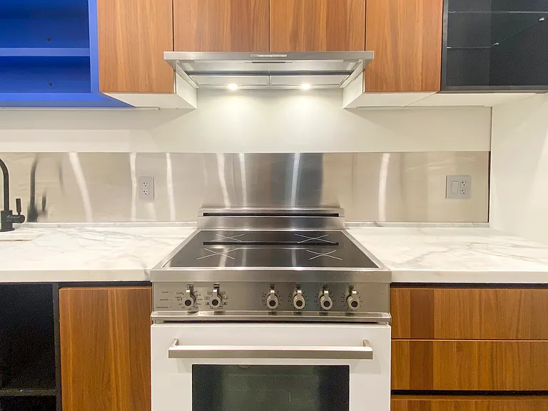 Induction range, vented hood