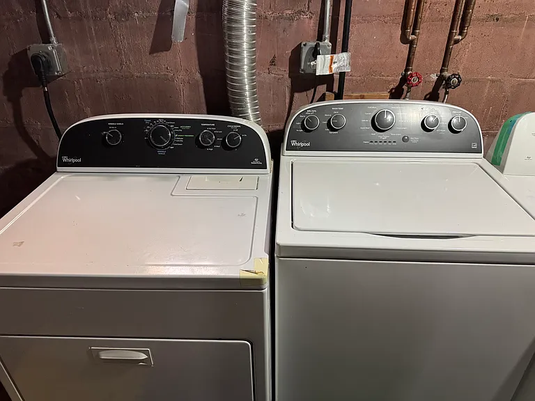 LAUNDRY machines for private use in the basement