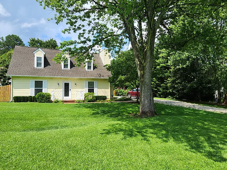 Home from the street - ample long driveway and parking