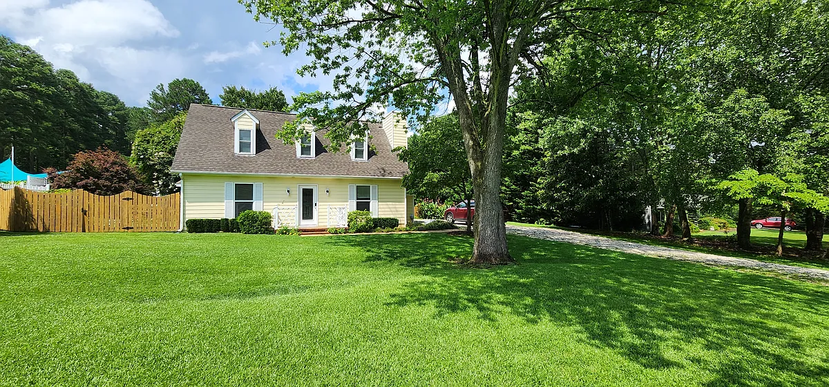 Home from the street - ample long driveway and parking - 209 Seasons Dr