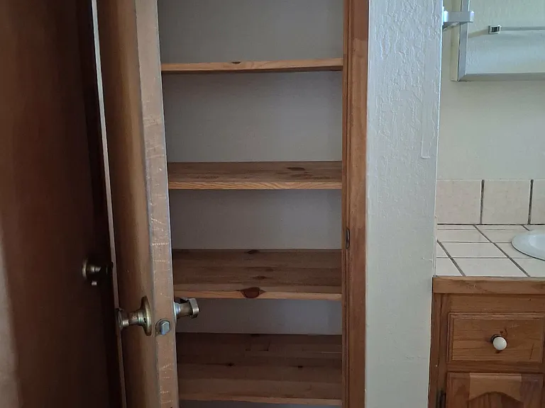 Linen storage in bathroom