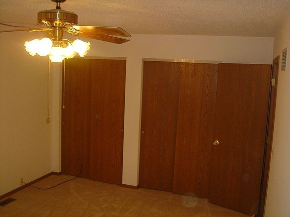 his & hers closets in master