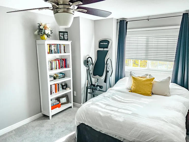 2nd bedroom with room for guest bed and home office.