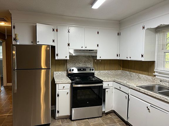 Kitchen with NEW stainless steel stove and refrigerator !!!!