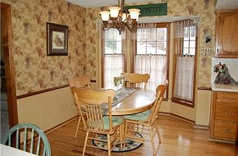Gorgeous bayed breakfast area with new hardwood floor