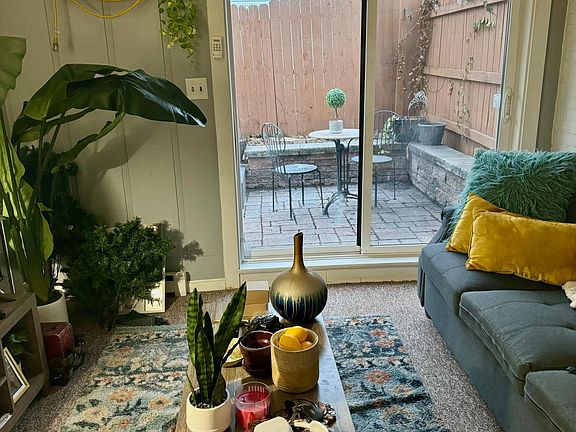 Living room and door to patio.