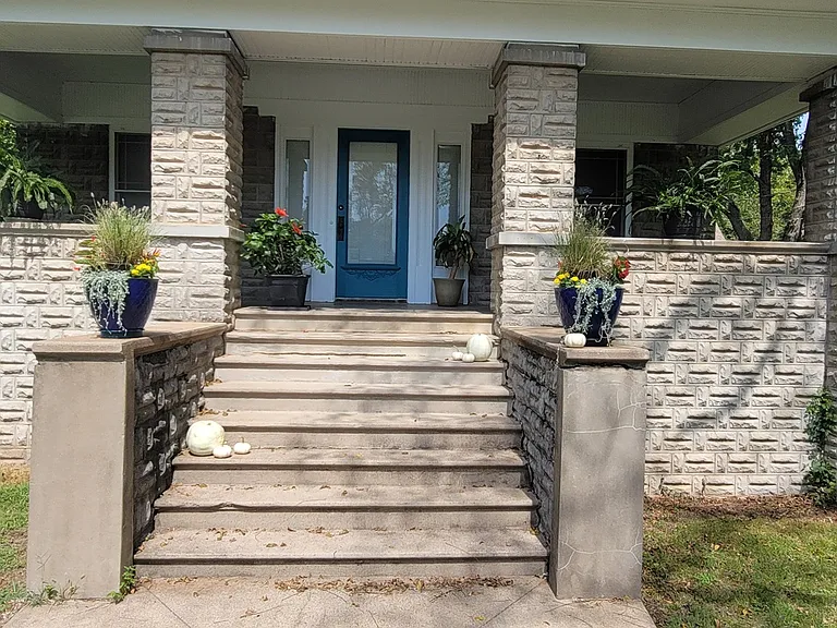 Full-length front porch to enjoy the fall nights and spring days!