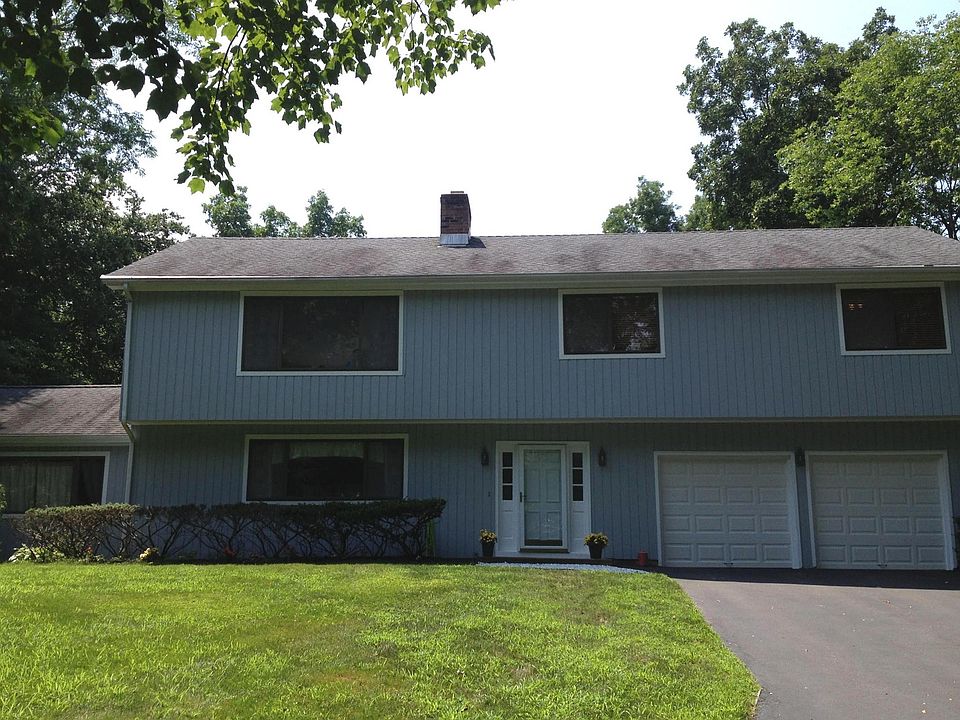 Greenfield Hill Colonial Hi-Ranch in a Gorgeous, Tranquil Setting 