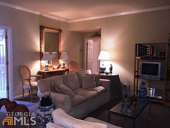 9 ' smooth ceilings with crown molding.