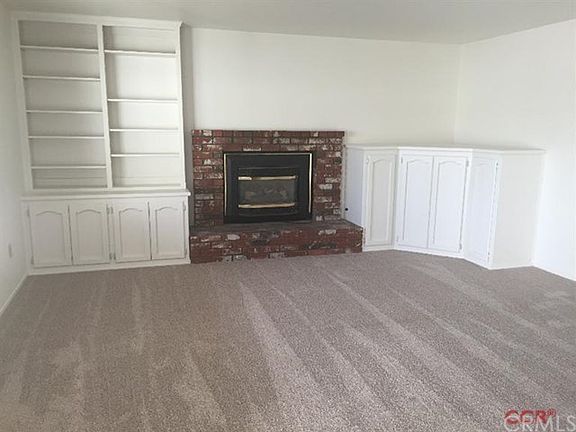 Fireplace with built in cabinets