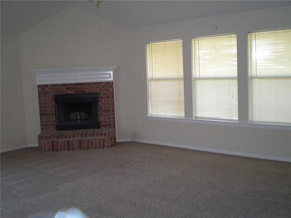 Corner wood burning fireplace