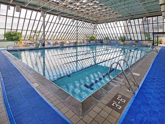 Olympic size indoor swimming pool with jacuzzi and separate 
