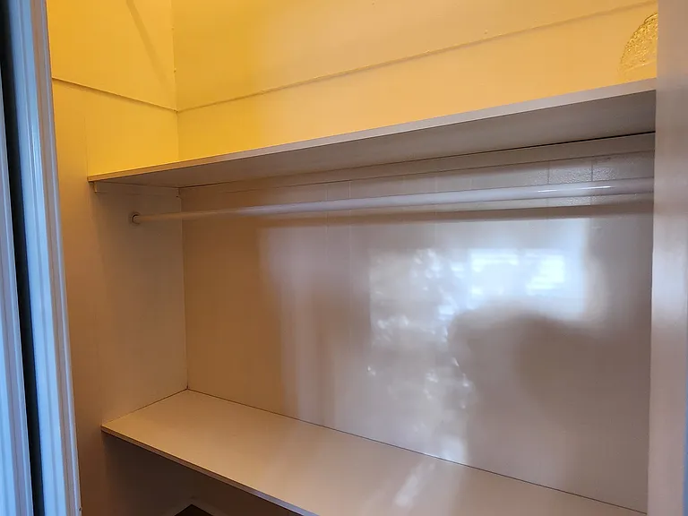 Large walk-in closet in back bedroom