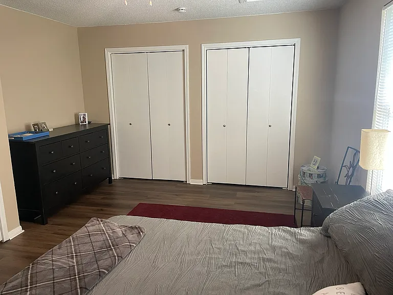 Bedroom on second floor with great light and new ceiling fan. With second bedroom on the second floor including a large walk in closet.