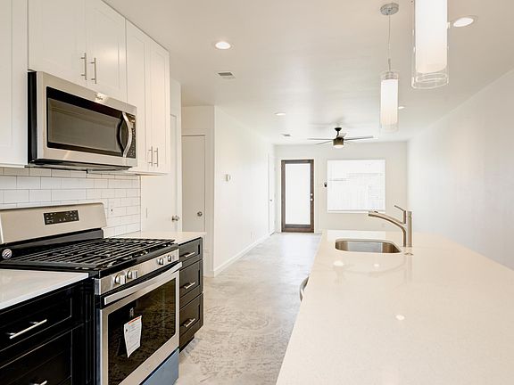Open Concept kitchen, dining and living.