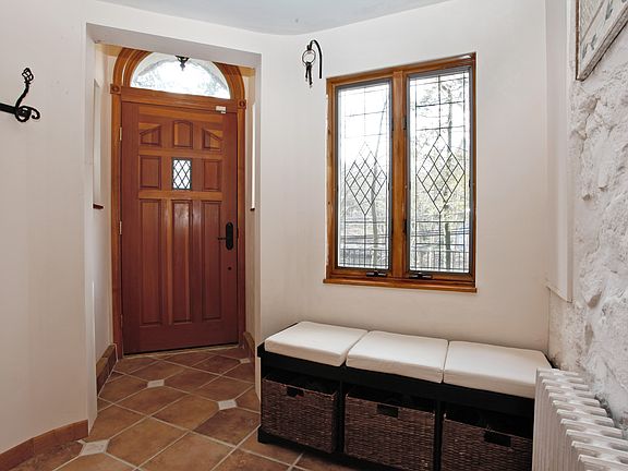 Front entrance hall with three windows