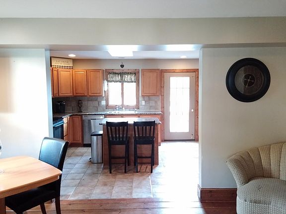 Entry Living Room looking into Kitchen