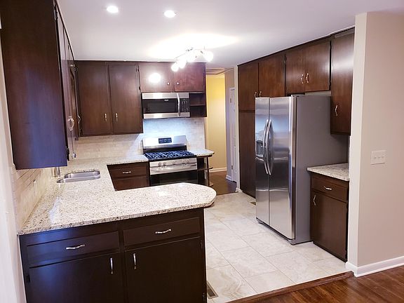 Kitchen with granite countertops and stainless steel appliances
