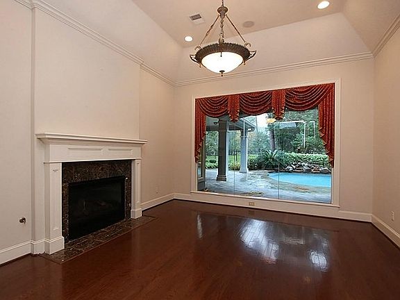 Formal Living has Hardwoods, Fireplace & Fabulous View